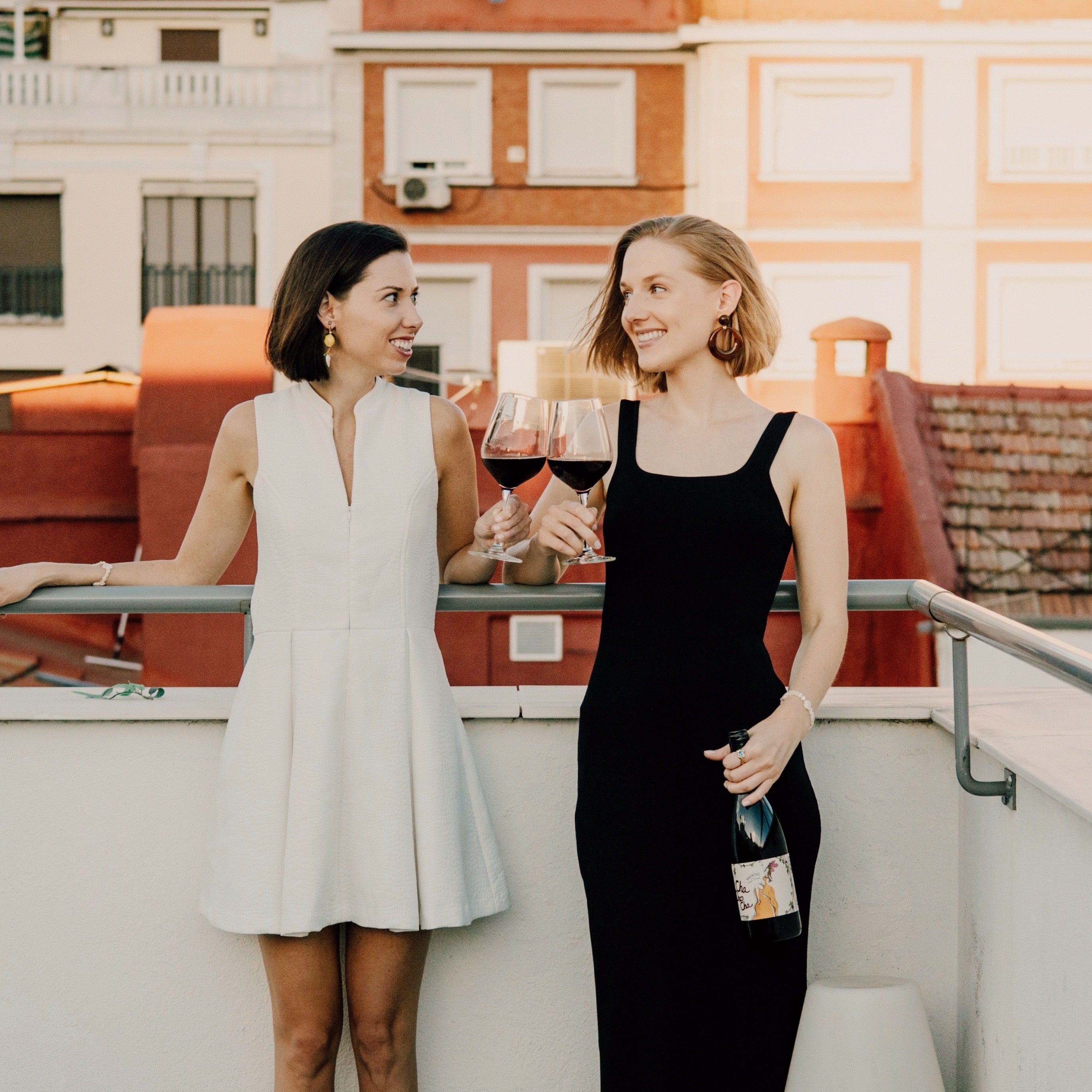 Sarah and Emily Offline Wine Founders on Rooftop with Cha Cha Cha Red Blend Wine