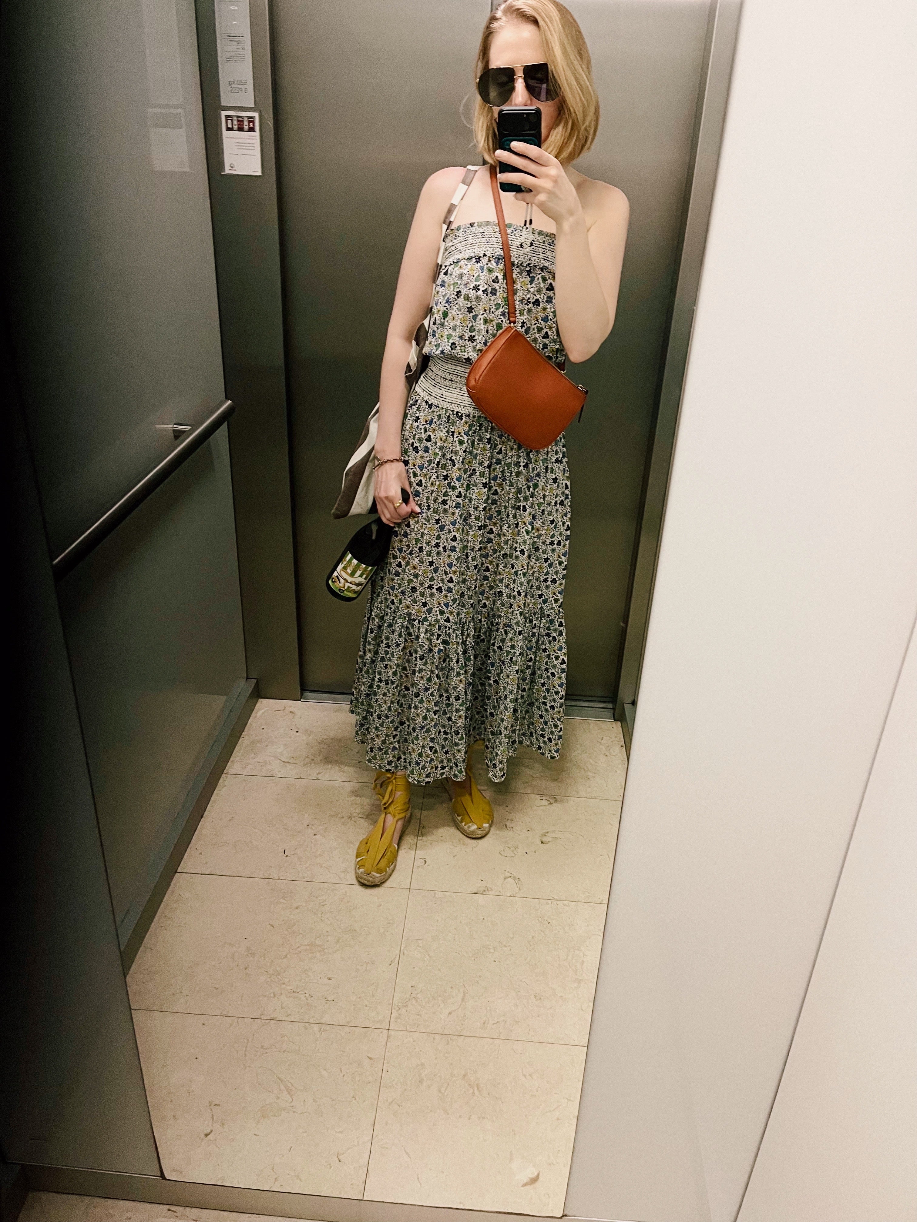 Out of Office White Blend Wine from Slovenia with Tory Burch Floral Midi Dress